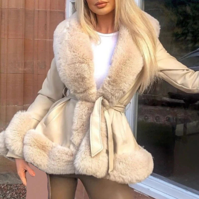 Women's coat made of faux leather with faux fur collar