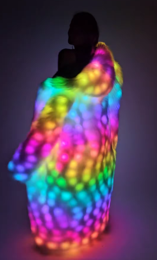 Snow Angel Glow: The Weighted Coat That Lights Up the Night