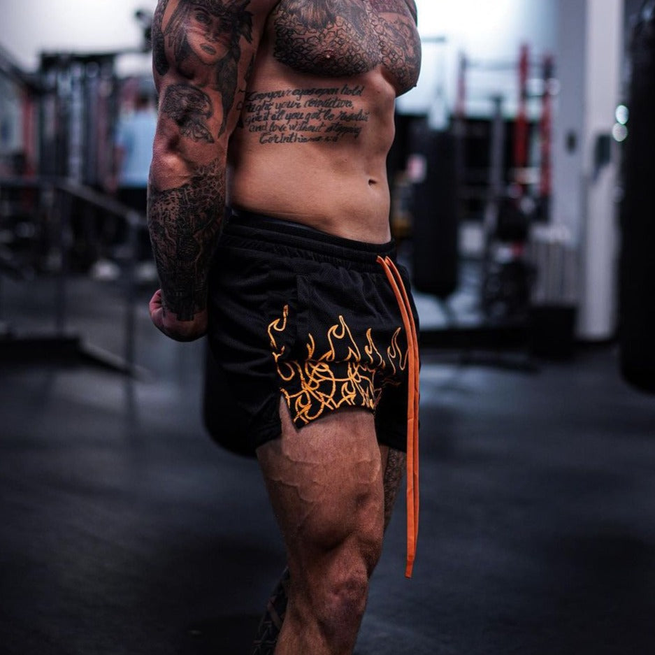 MUAY THAI FLAME SHORTS (MID THIGH CUT) - BLACK / NEON ORANGE