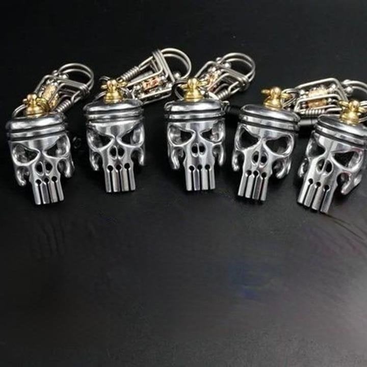 Piston art skull keychain (pendant/flashlight)