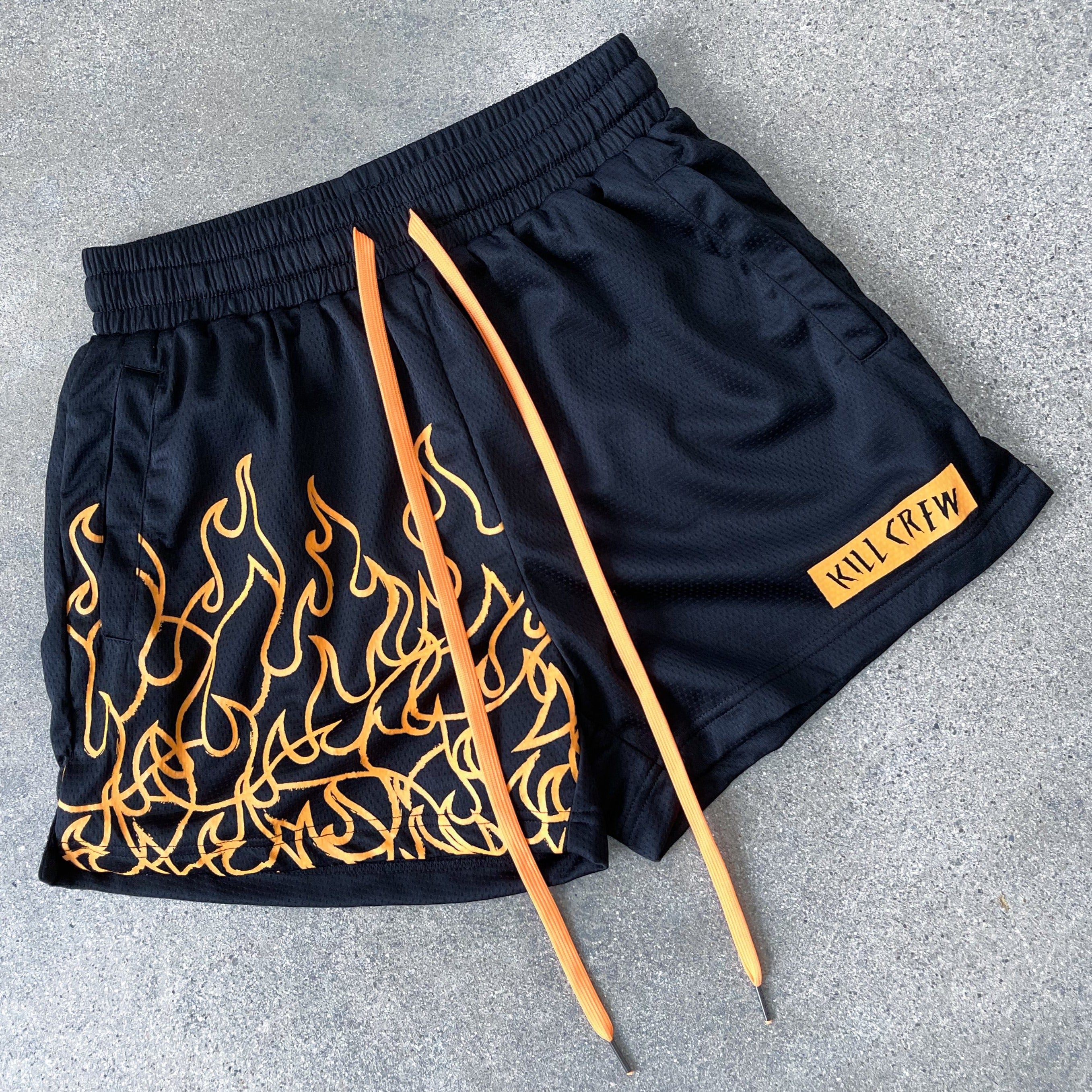 MUAY THAI FLAME SHORTS (MID THIGH CUT) - BLACK / NEON ORANGE