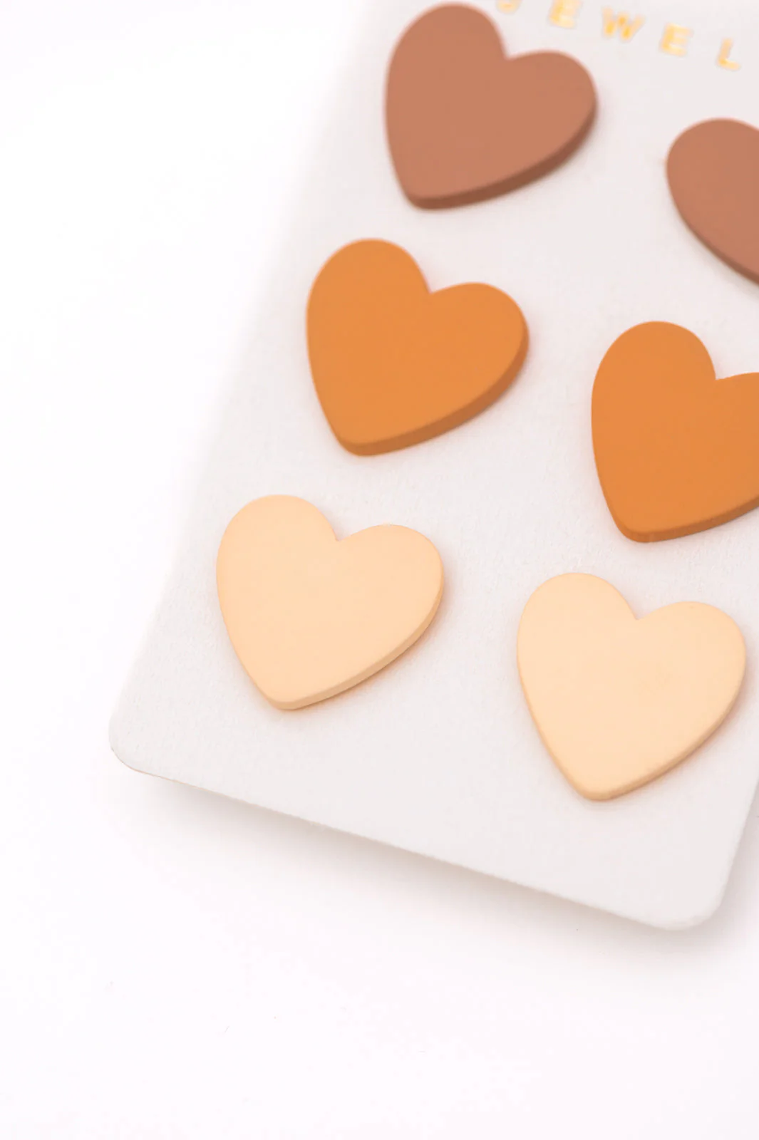 Triple Hearts Studs in Brown