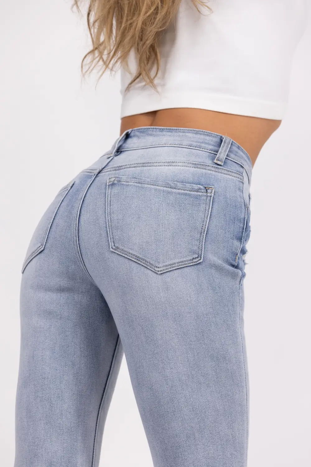 The Chelsea from Lovervet: Mid-Rise Tummy Control Distressed Bootcut Denim